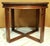 Robert Irwin mid century modern round table with faux clavos in walnut is a sturdy and stylish example of the vintage...