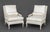 Pair of Louis XVI Style White Painted Wood Fauteuils, with silk-blend white upholstered cushions and lumbar pillows. 35.5"...