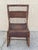 Antique Victorian Wicker and Rattan Wooden Small Rocking Chair Rocker. Item features a solid wood wicker wrapped frame,...