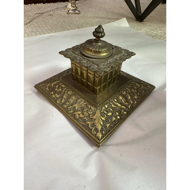 This listing is for an antique English brass inkwell In overall good condition. Top is a tad off center from normal use...