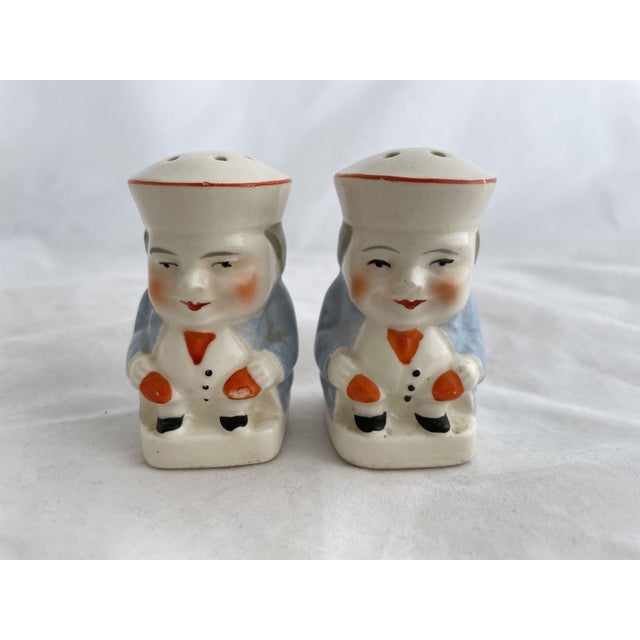 Wonderful colonial pair of salt and pepper shakers. In the style of "Toby," made in Japan. Dimensions (each): 1.5"W x...