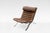 The Ari Chair by Arne Norell is a stunning example of Scandinavian Modern design, combining luxury with effortless...