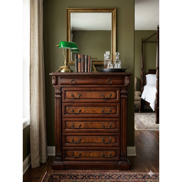 Bring timeless elegance and exceptional storage to any bedroom with this beautifully crafted traditional tall chest....