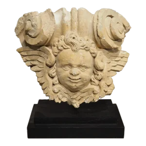 A 17th Century Mounted French Limestone Carving of a Winged Angel