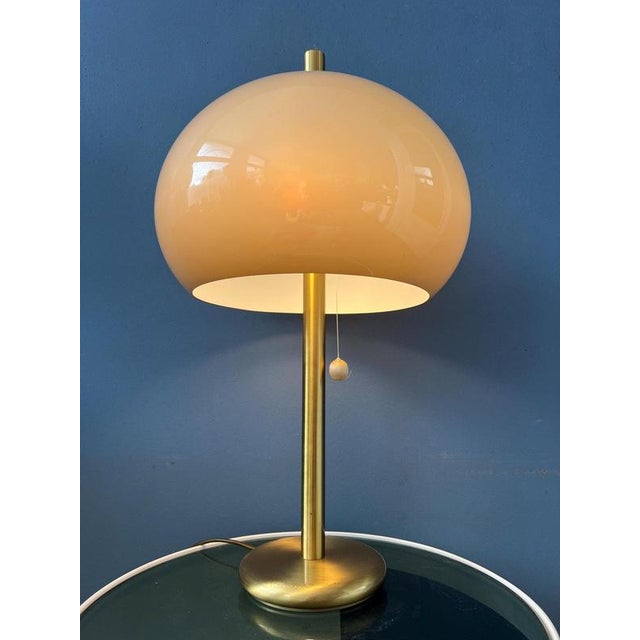 Unique large vintage mushroom table lamp with acrylic glass shade and brass base. The beige/brown mushroom shades produces...