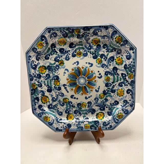 Hand-painted Italian maiolica platter crafted in Caltagirone, Sicily, a region internationally renowned for its ceramic...