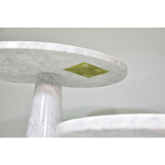 Carrara marble coffee table with a top resting on conical bases, designed by angelo mangiarotti for skipper, part of the...