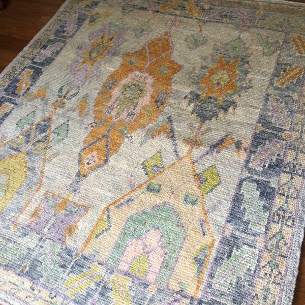 A more expressive interpretation of the Oushak tradition, this hand-knotted Turkish rug is defined by its large-scale...