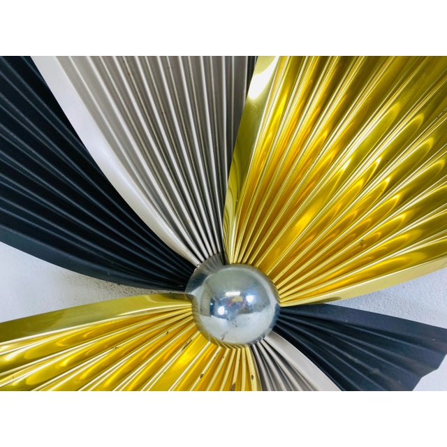 This is a mid century, modern wall sculpture by the artist Curtis Jere. This asian inspired brass and steel wall sculpture...