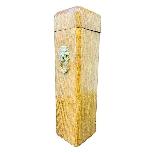 Late 20th Century Oak Fireplace Matchbox Holder with Brass Lion Pull. Features include a hinged lid, striker paper holder,...