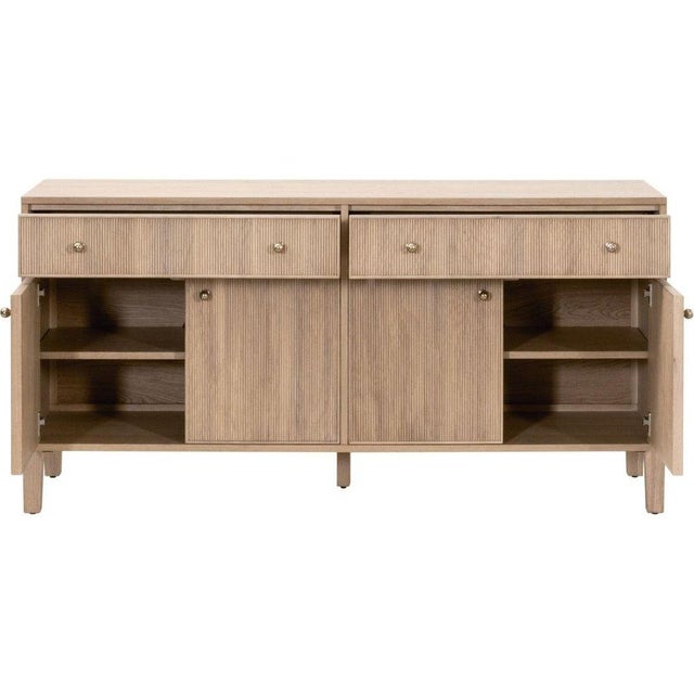 The Highland Media Sideboard by Essentials For Living combines a classic design with practical storage solutions. Crafted...