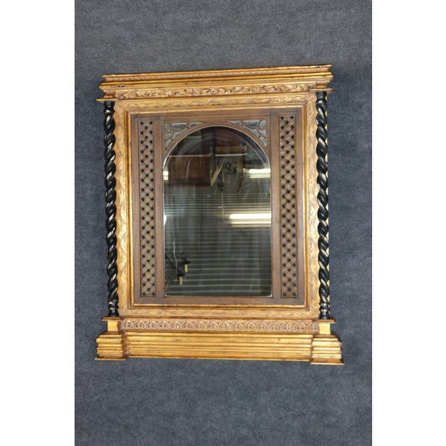 This is a superb hand-carved gilded and intentionally distressed over-mantel mantle mirror and perfect for a buffet or...