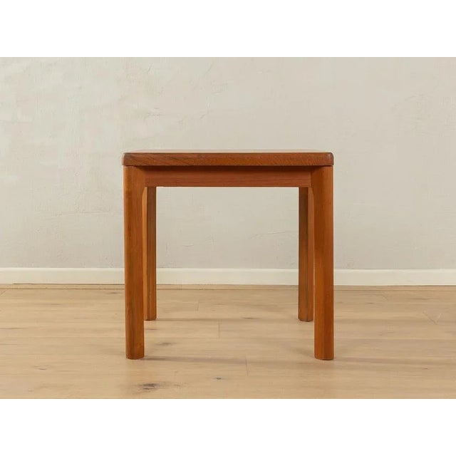 Classic side table by Møbelfabrikken Toften from the 1960s. Solid frame and table top with solid wood edges in teak...