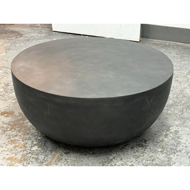 Design Plus Gallery presents the Basil Outdoor Round Coffee Table from Four Hands. Formed from aluminum, the table has a...