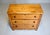 An American pine chest of three drawers, original locks and working key with scalloped apron. Very sweet and sturdy, circa...