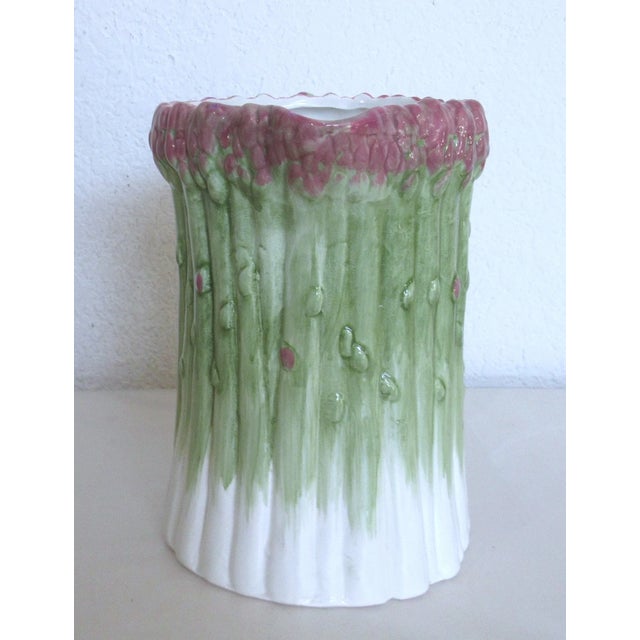 Bring a touch of whimsical elegance to your table or décor with this vintage **Fitz & Floyd Asparagus Pitcher**....