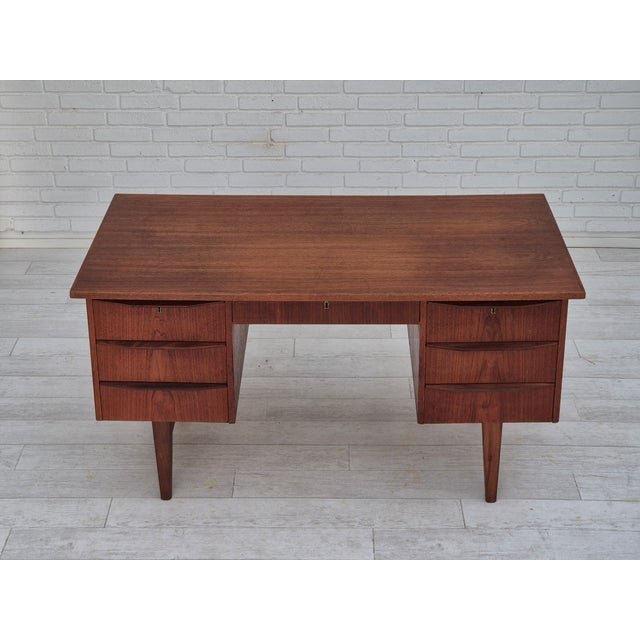 1960s, Danish teak wood desk. Original very good condition: no smells, no stains, and stable construction. Teak wood,...