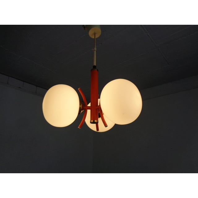 A pair of ceiling lamps, each with 3 light sources, by Richard Essig from the 1970s. I have official proof of authenticity...