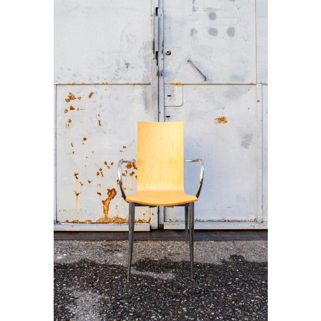 Armchair with chromed metal tubular frame and maple veneered plywood seat. Eleph Series Olly Tango Model Designer Philippe...