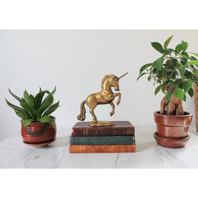 Vintage brass unicorn figure. Made in Taiwan. Makers mark on bottom. Patina.