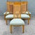 Striking set of six vintage Mid-Century Modern dining chairs featuring tall, dramatically proportioned backs with woven...