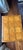 By Baker Furniture USA, Circa 1980s Carved walnut, with burl wood parquet top. Measures: Table 1: 22"W x 17"D x 22.25"H....