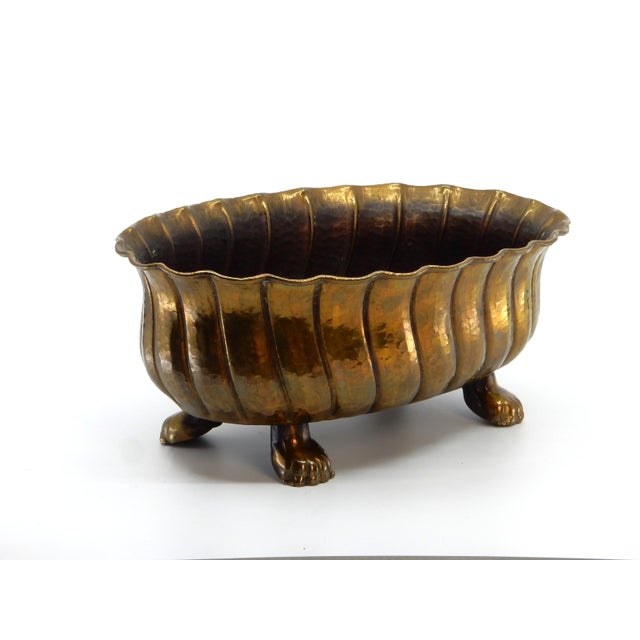 Hammered brass claw footed bowl attributed to Egidio Casagrande, Italian 1960's. Signed on bottom. No issues to report....