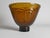A striking mid-century modern art glass bowl by Flygfors Sweden, designed by Wiktor Berndt, with an expressive facial...