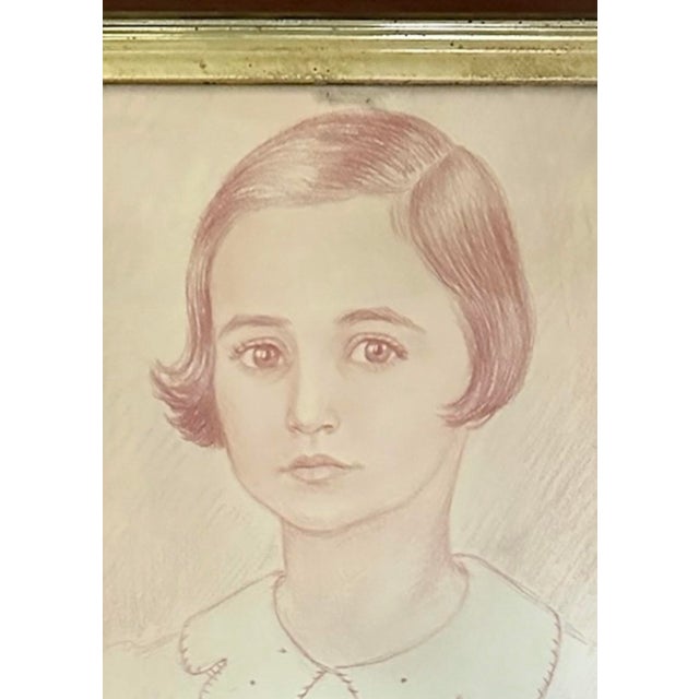 A charming, antique portrait drawing. Features a portrait of a young girl with a short pageboy haircut and a...