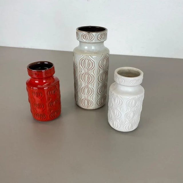 Article: Set of three fat lava art vases Model: 285 Producer: Scheurich, Germany Decade: 1970s These original vintage...