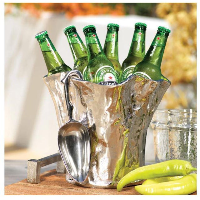 Everyone needs a fabulous but functional ice bucket for cocktail hour. Our aluminum bucket does just that. Fit a couple...