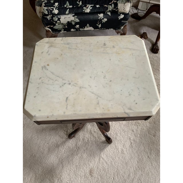 Victorian walnut marble top table 18” wide, 14” deep and 28” tall