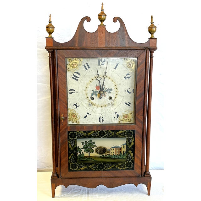 Rare antique 'Riley Whiting' eight-day wind mantel clock from the 1800's. It is beautifully constructed of mahogany with...