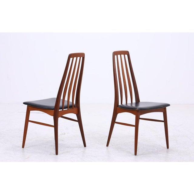 Original set of two "Eva" dining chairs by Niels Koefoed from Denmark. The slim silhouette, the elegantly curved backrest,...