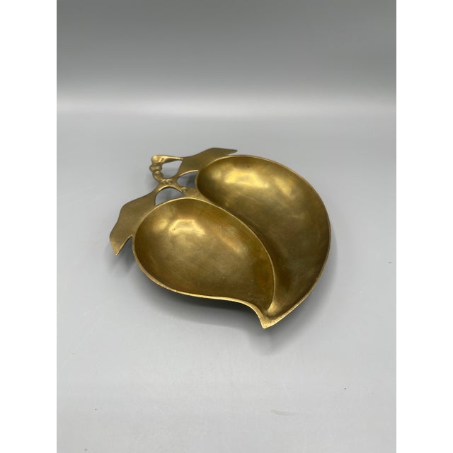 Vintage solid brass decorative divided dish featuring two smooth overlapping leaf-shaped compartments with an openwork...