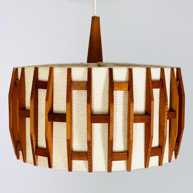 Mid century -century pendant lamp made of teak wood and jute , 1960s, Denmark Beautiful mid-century pendant lamp from...