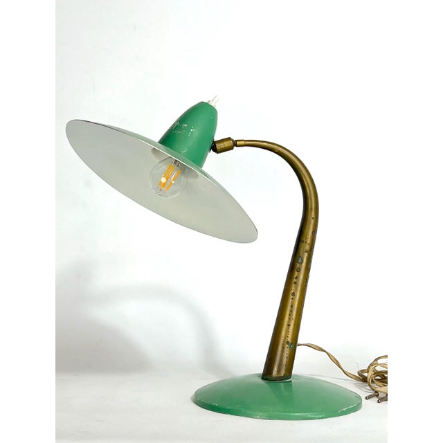 Original vintage condition with trace of age and use with some loss of lacquer and patina on the brass. Full working with...