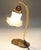 Table lamp produced in Austria-Hungary at the beginning of the twentieth century. The lampshade resembles a flower chalice...