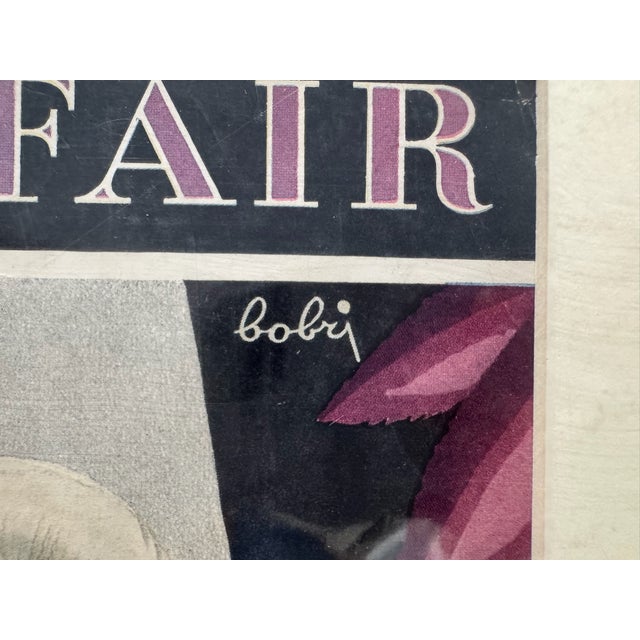 Original period front cover from the November 1928 issue of Vanity Fair magazine, featuring a mysterious Art Deco woman...