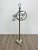 Mid-century floor towel holder in a silver brass structure made in Italy, circa 1950. The towel handles are embellished...
