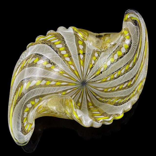 Beautiful, vintage Murano hand blown yellow, white and gold flecks Italian art glass center piece bowl. Documented to the...