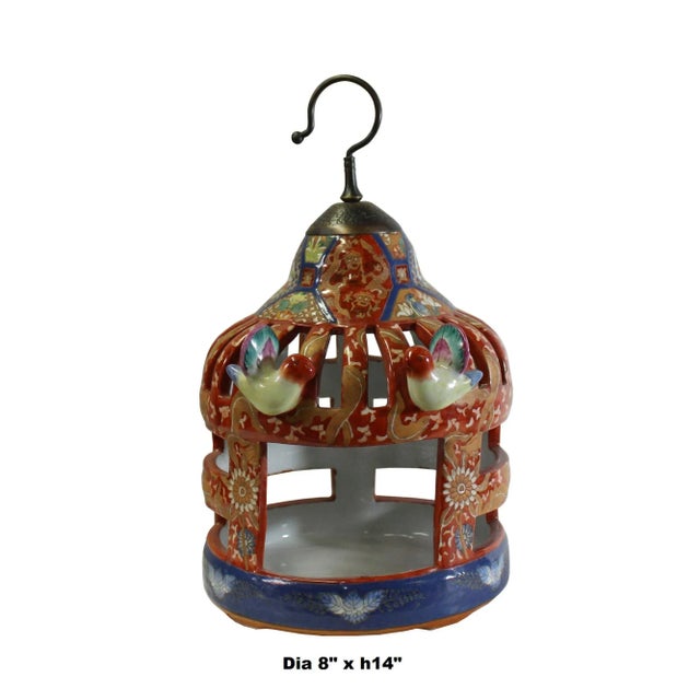 This is a hand made oriental red color (Chinese Imari Style pattern ) ceramic birdcage shape display figure. It was one of...