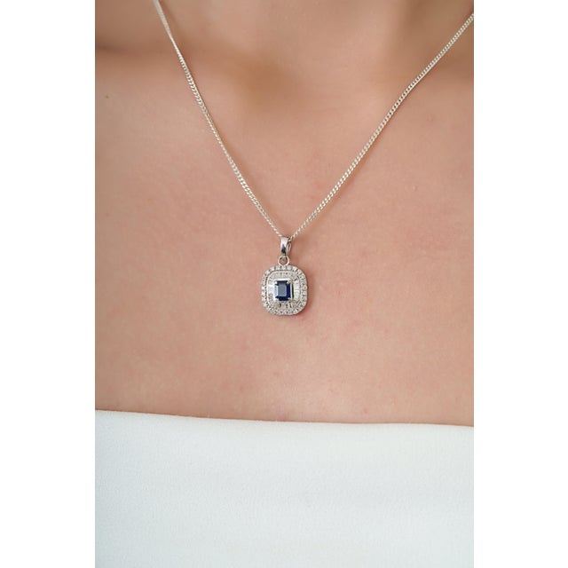 This elegant 14K white gold pendant features a 0.54 carat blue sapphire, set in 14k white gold. The sapphire measuring 4.3...