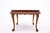 A carved table from the early 20th century. An elegant interior accent. It works perfectly as a coffee table in the living...