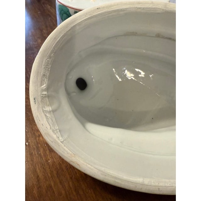 This Chinese Famille Rose Duck Tureen offers a perfect blend of practicality for serving and its unique figural lid makes...