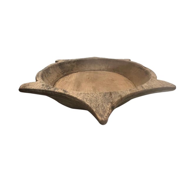 This vintage wood Parat bowl from India was once used to knead bread dough. It is a beautiful rustic piece and can be used...