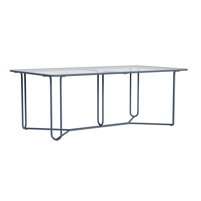 A free flowing frame design and transitional glass tabletop define the Walter Lamb Aluminum 20" Round Occasional Table....