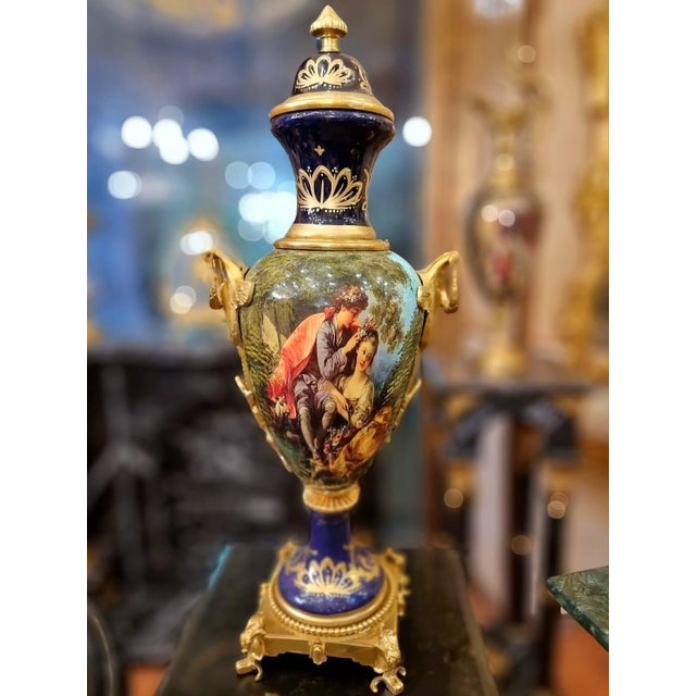 Elevate your interior with this exquisite French-style porcelain vase, a timeless decorative piece designed to bring...