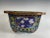 A large 19th century Chinese cloisonné enamel jardiniere. Quatrefoil shaped. The rim with a bold key pattern and the...