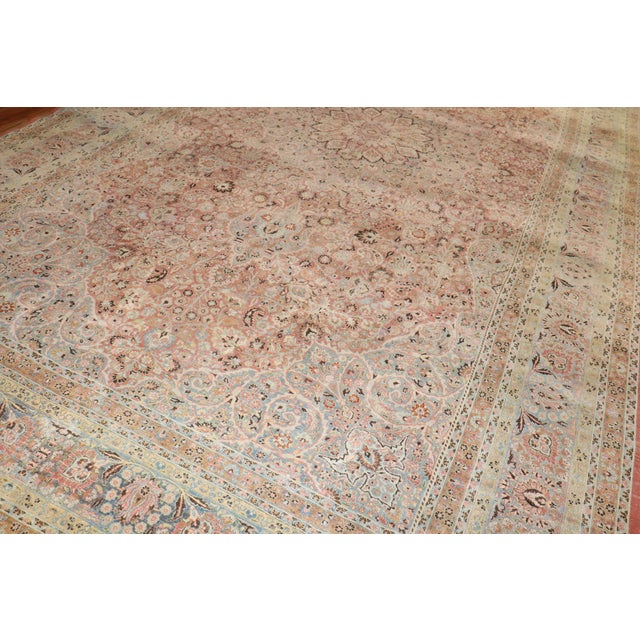 An oversize Formal Persian Meshed rug from the early 20th century. Measures: 11'2'' x 19'